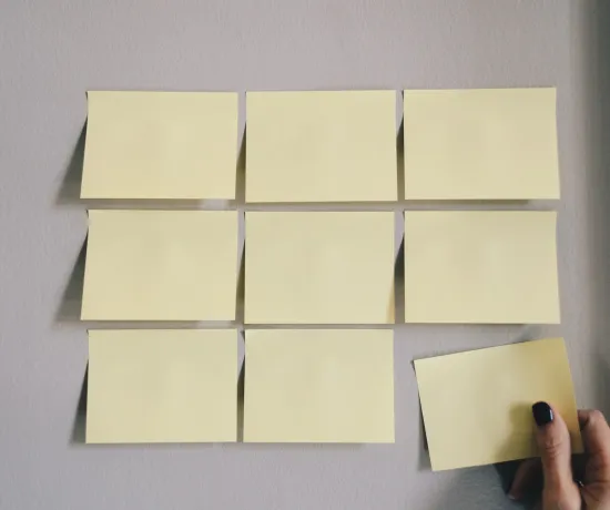 Sticky notes on a wall.